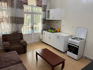 Kitchen with stove and cabinets