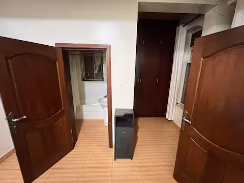 Hallway with fitted wardrobes